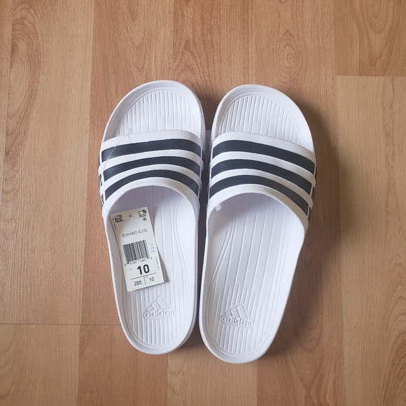 adidas duramo slide on feet